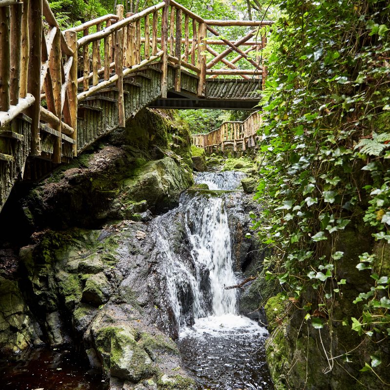 Water running under bridge in scotland