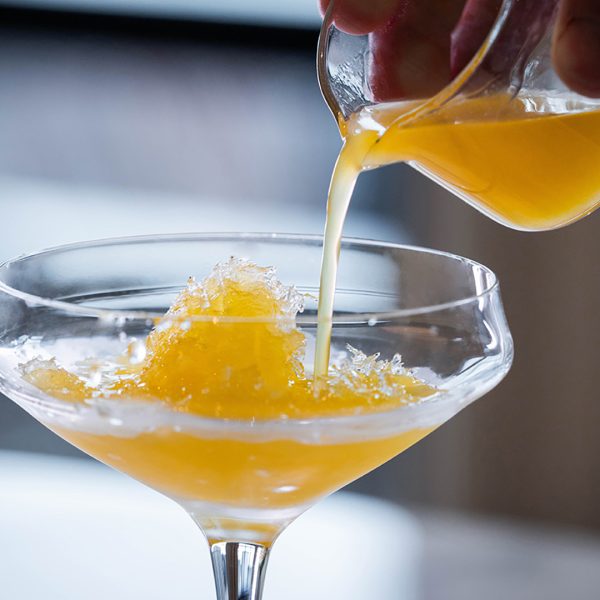 Cocktail being poured at Tales 2024