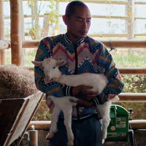 Man holding a lamb